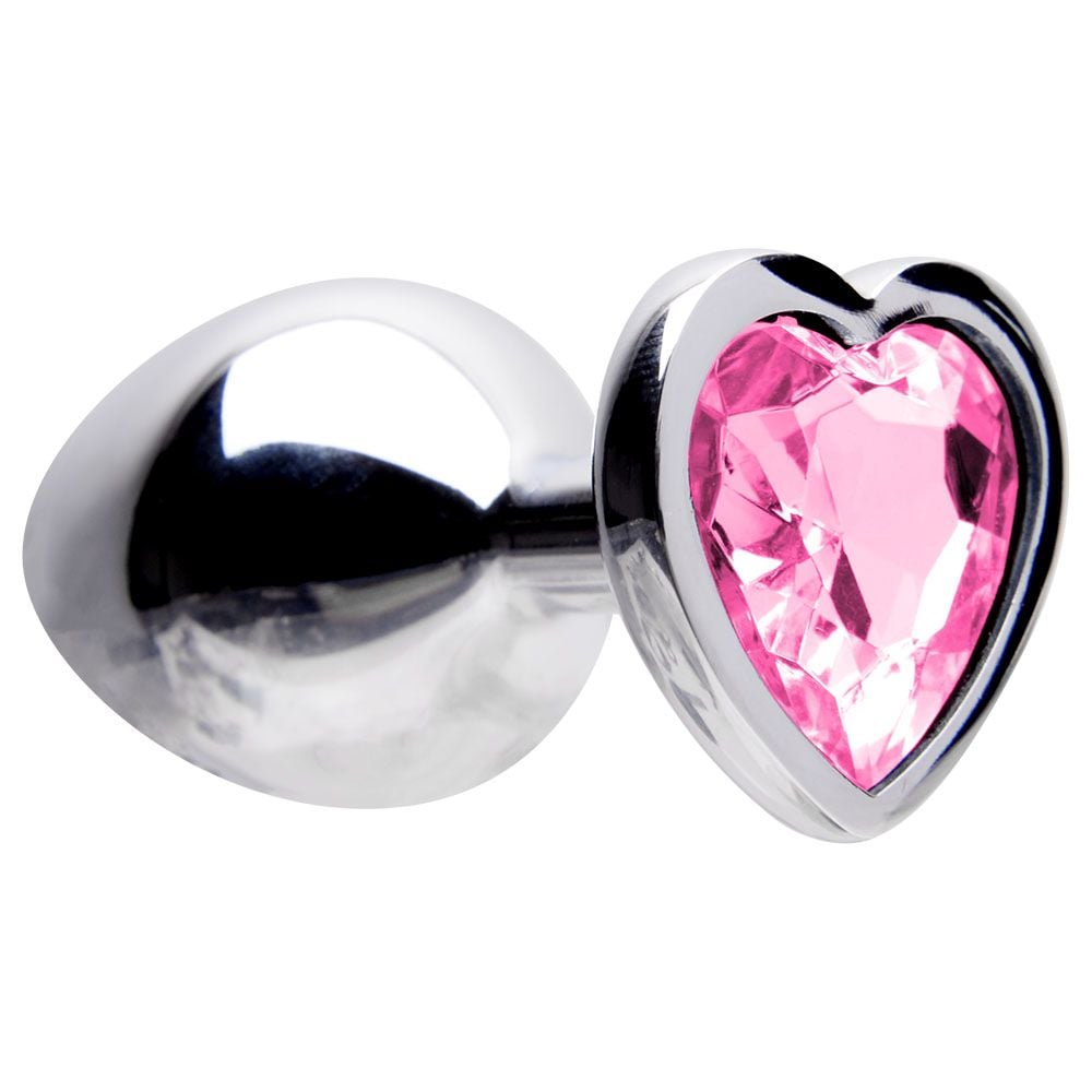 Plug anal de metal com pedra em formato de coracao rosa